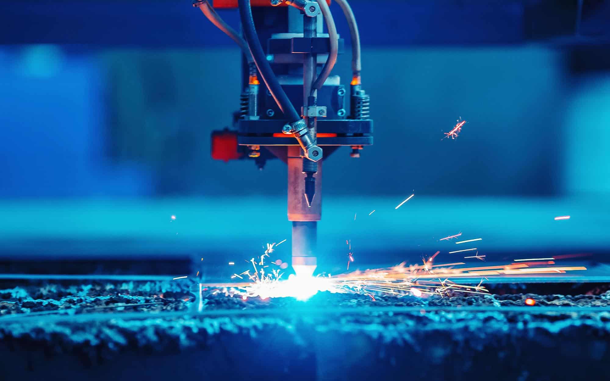 Closeup of welding robot in manufacturing